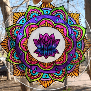 Colorful mandala painted on glass, artwork from the Stained-Glass Mandalas event